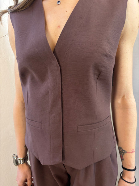 Gilet bottoni nascosti